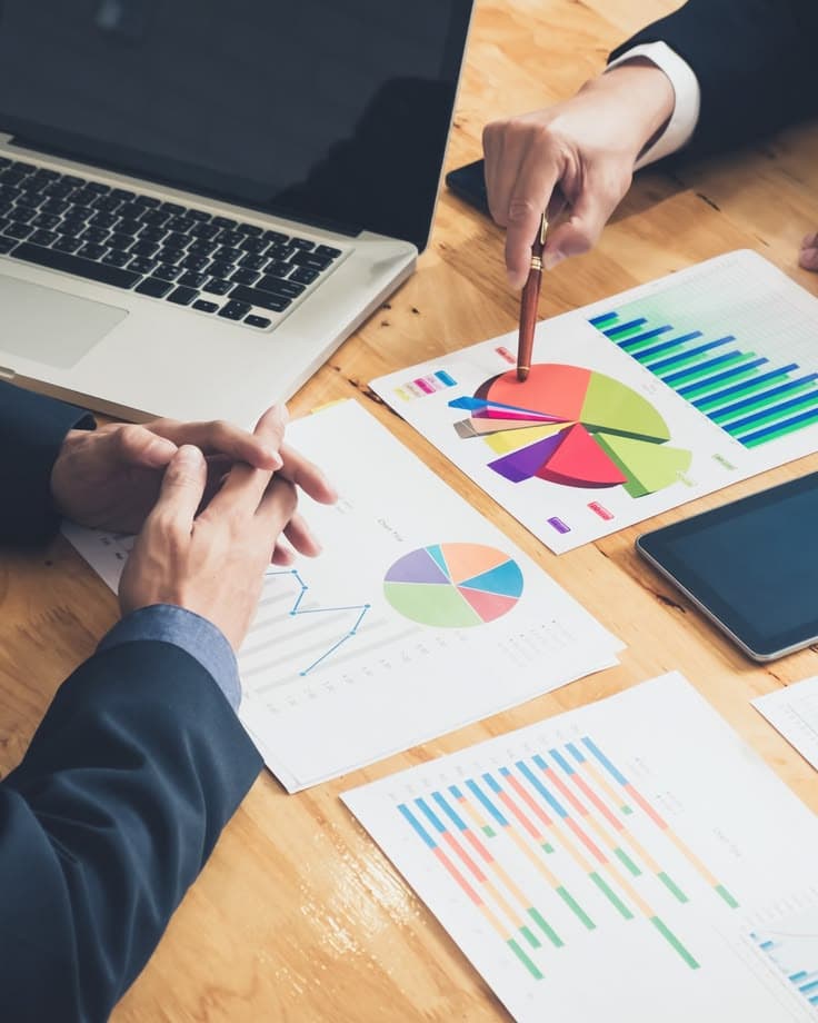 Campaign data and reporting materials laid out for review